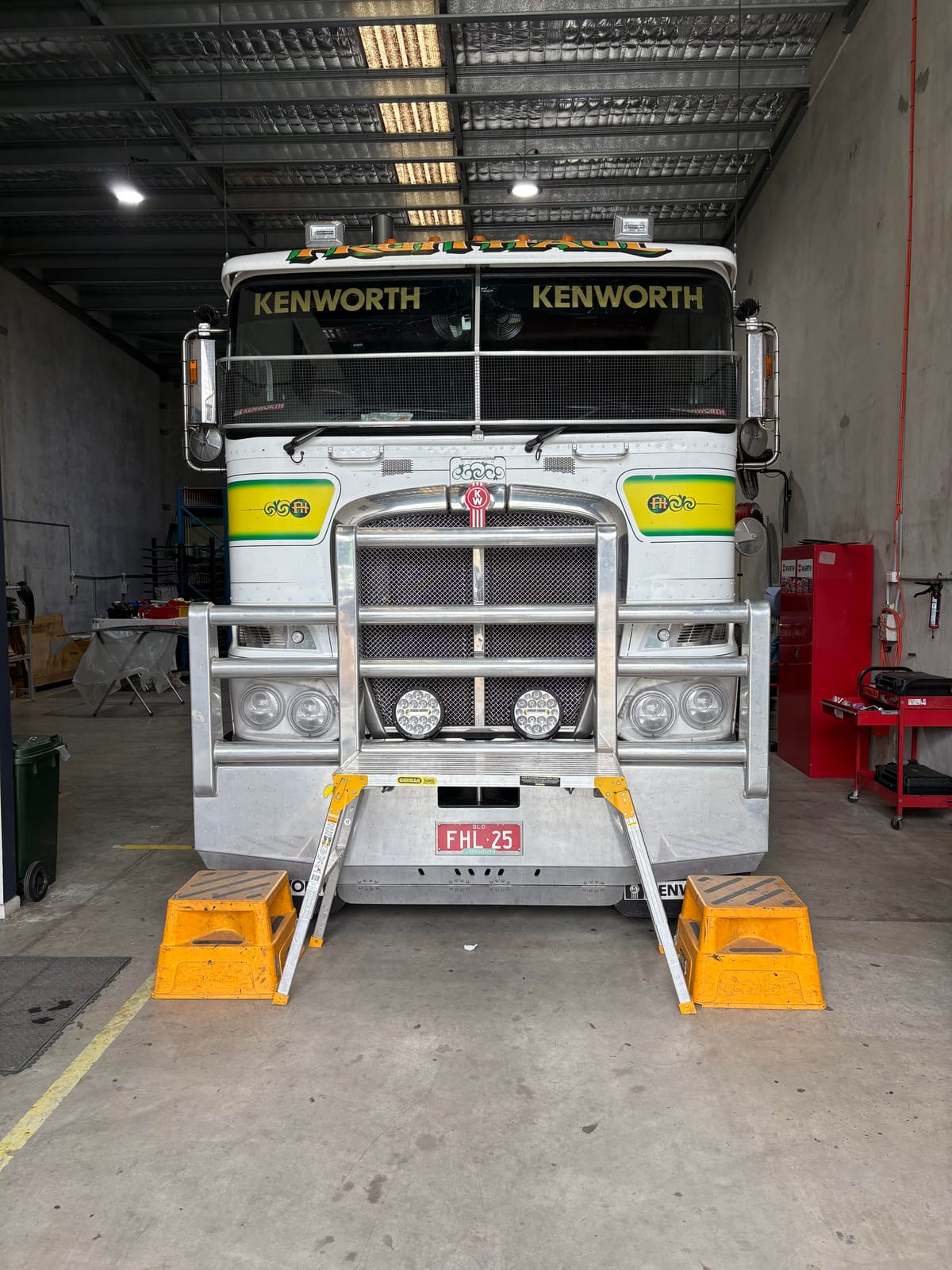 A Kenworth prime mover in the Morayfield Auto Glass workshop at Caboolture South for a new truck windscreen